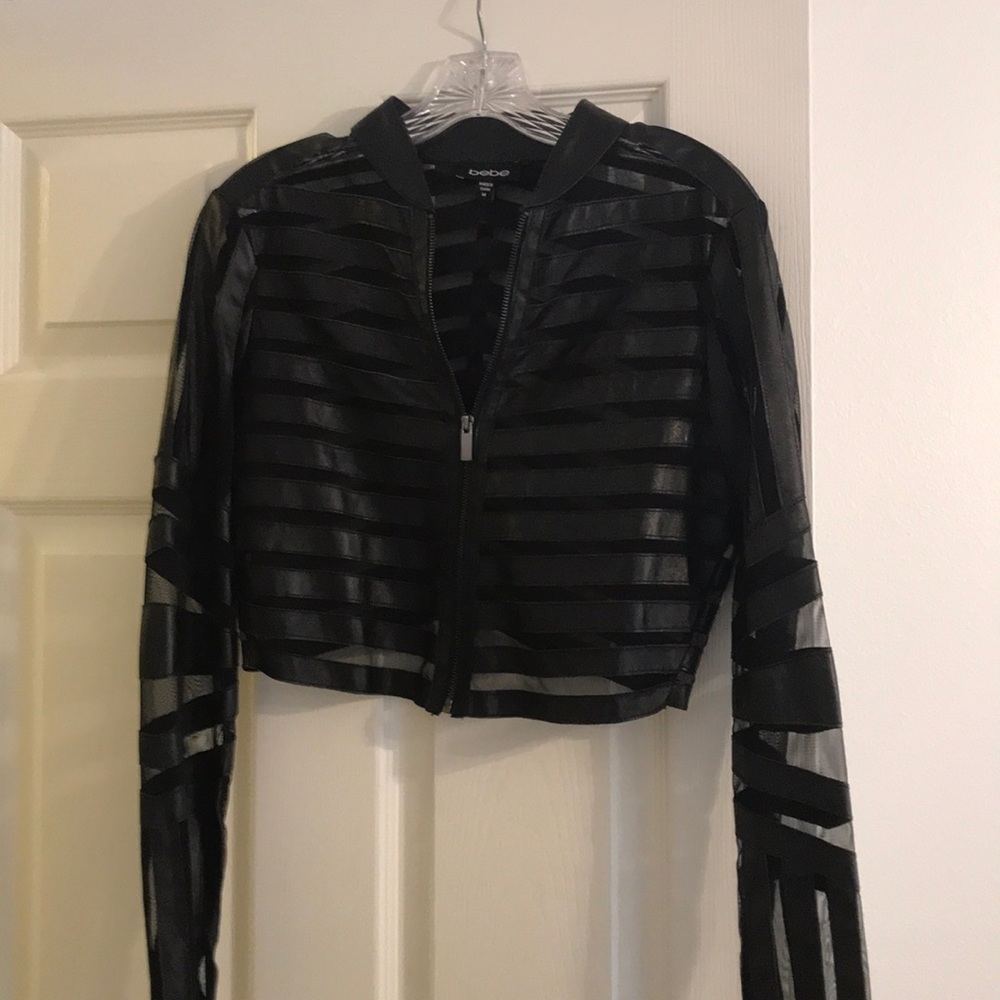 Black sheer/leather crop jacket.